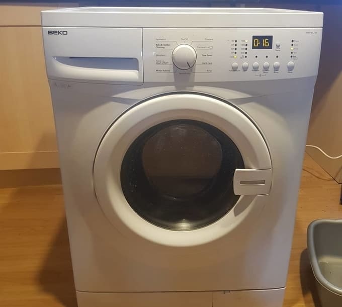 Beko  Comment retirer la cale du moteur de mon nouveau lave-linge ? 